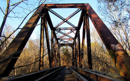 Photo showing an abandoned railroad bridge